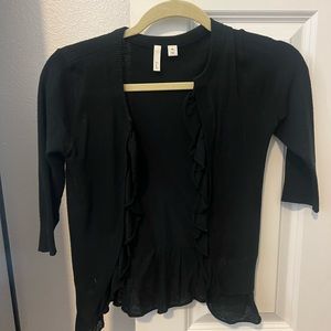 Black ruffled sweater